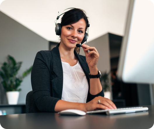 Professional support team assisting customers in an office environment